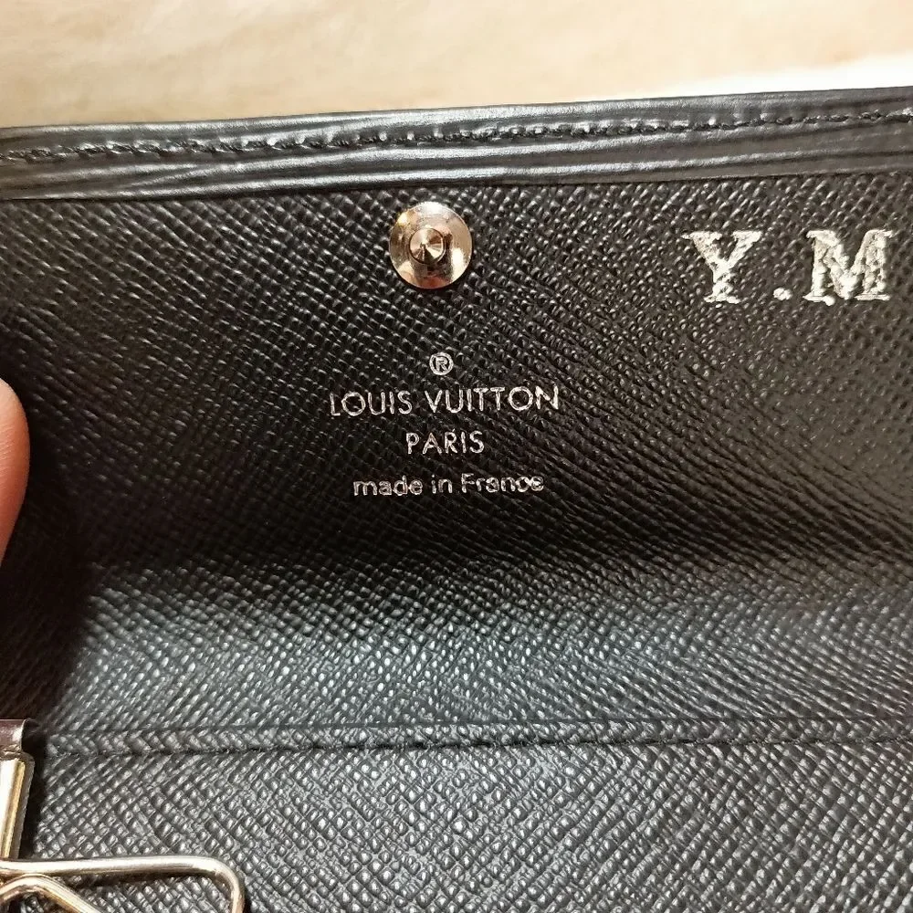 Authentic Louis Vuitton keyring with unbranded Keychain/bag charm of you…